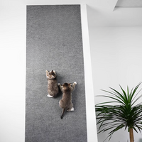 Giocattolo tiragraffi per gatti adesivo da parete e tappetino da gioco