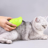 Peigne de massage de brosse de toilettage de jet d'atomisation pour des chats