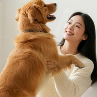 Dog and owner after a bath-free mitt cleaning