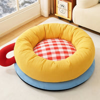 Yellow donut cat bed with red gingham cushion and carry handle