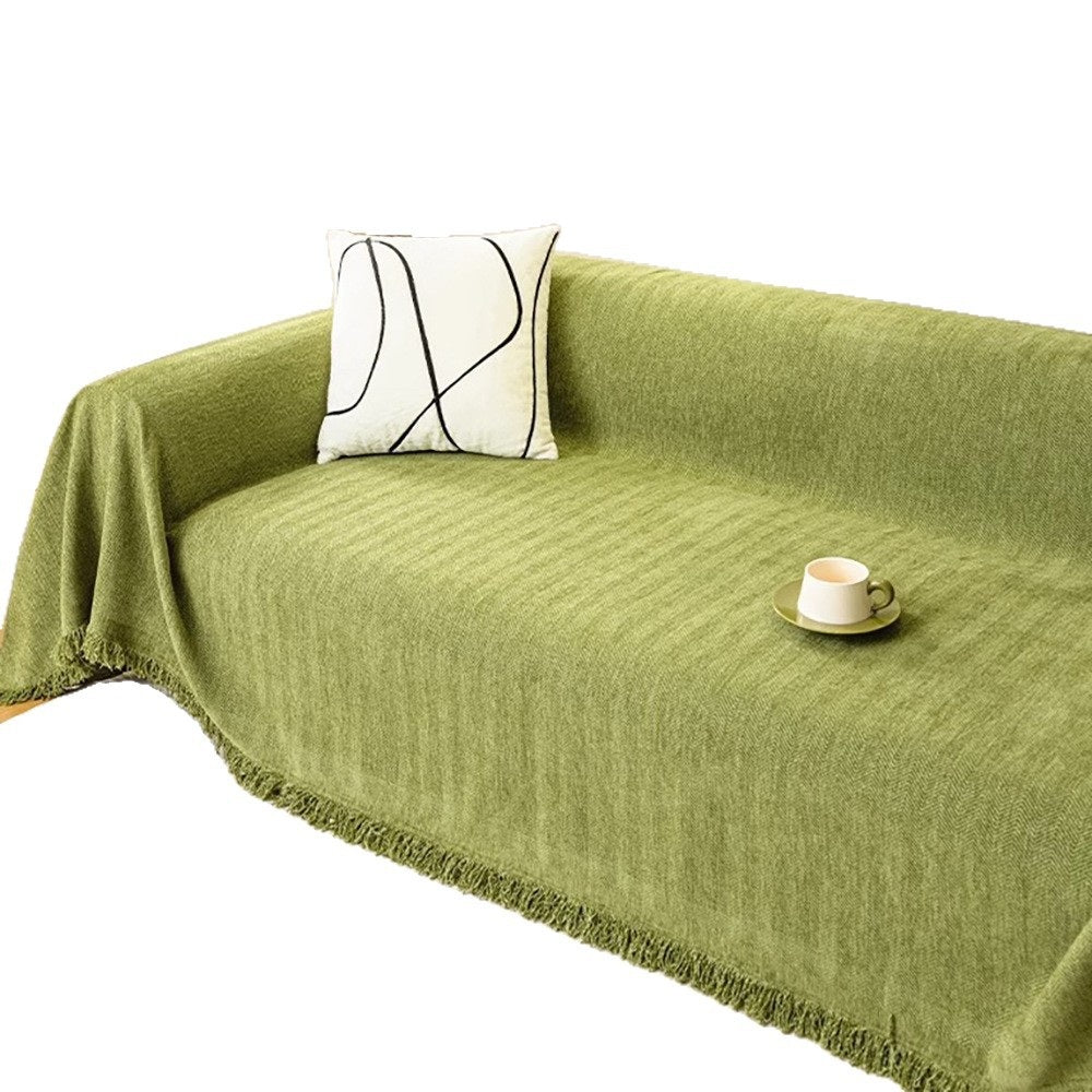 Matcha green herringbone chenille sofa cover with tassel fringe