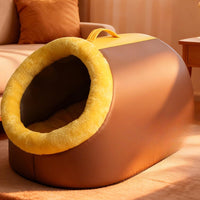 Brown cat cave bed in a living room