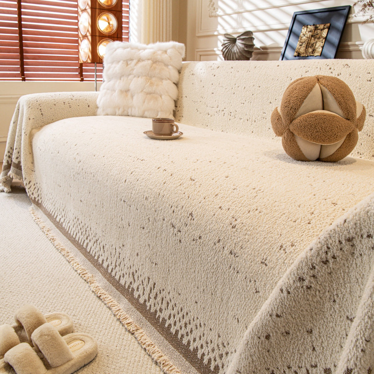 Speckled plush sofa cover in ivory and coffee