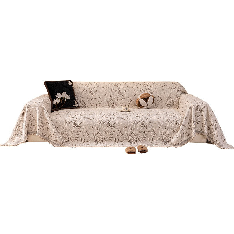 Full sofa draped in the plush cover