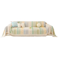 Striped chenille sofa cover draped over a sofa
